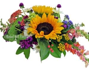 large sunflowers with red purple and green accents