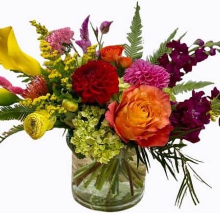 This bright and stylish arrangement including roses, calla lilies, hydrangea and more would brighten anyone's day!